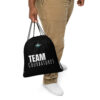 all-over-print-drawstring-bag-white-front-2-6a247beb129f6.jpg Sac à cordon TEAM COURBATURES